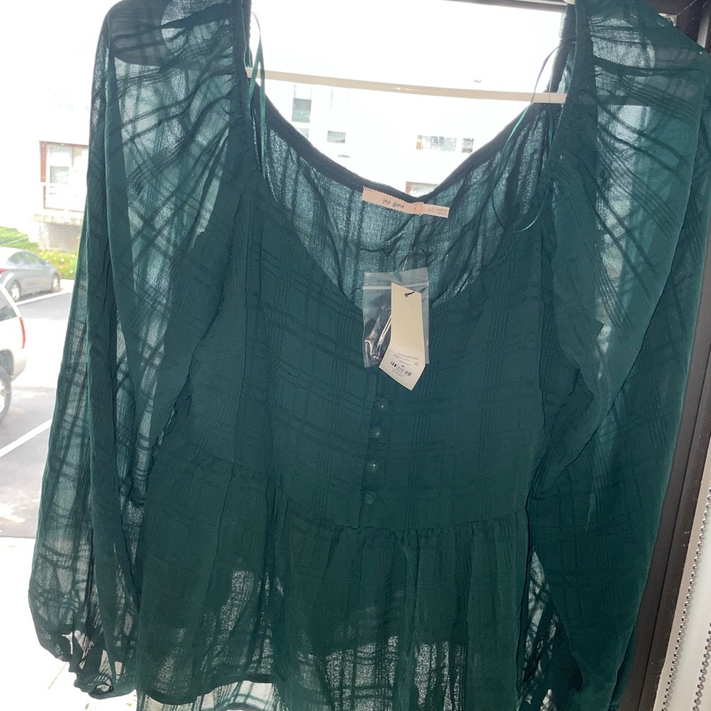Francesca’s green shirt/blouse
